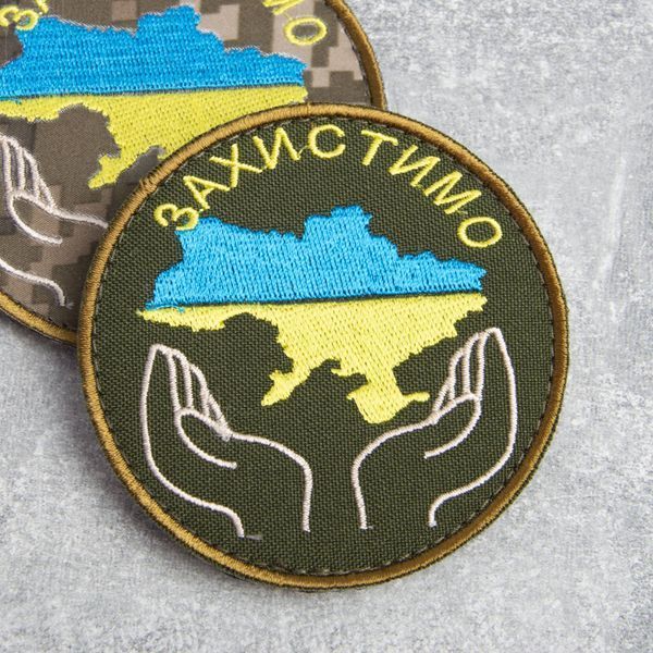 Шеврон на липучке Захистимо Україну 8 см хаки 800029560*002 фото